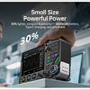 A hand holds a black FNIRSI 2D15P oscilloscope multimeter and signal generator device.