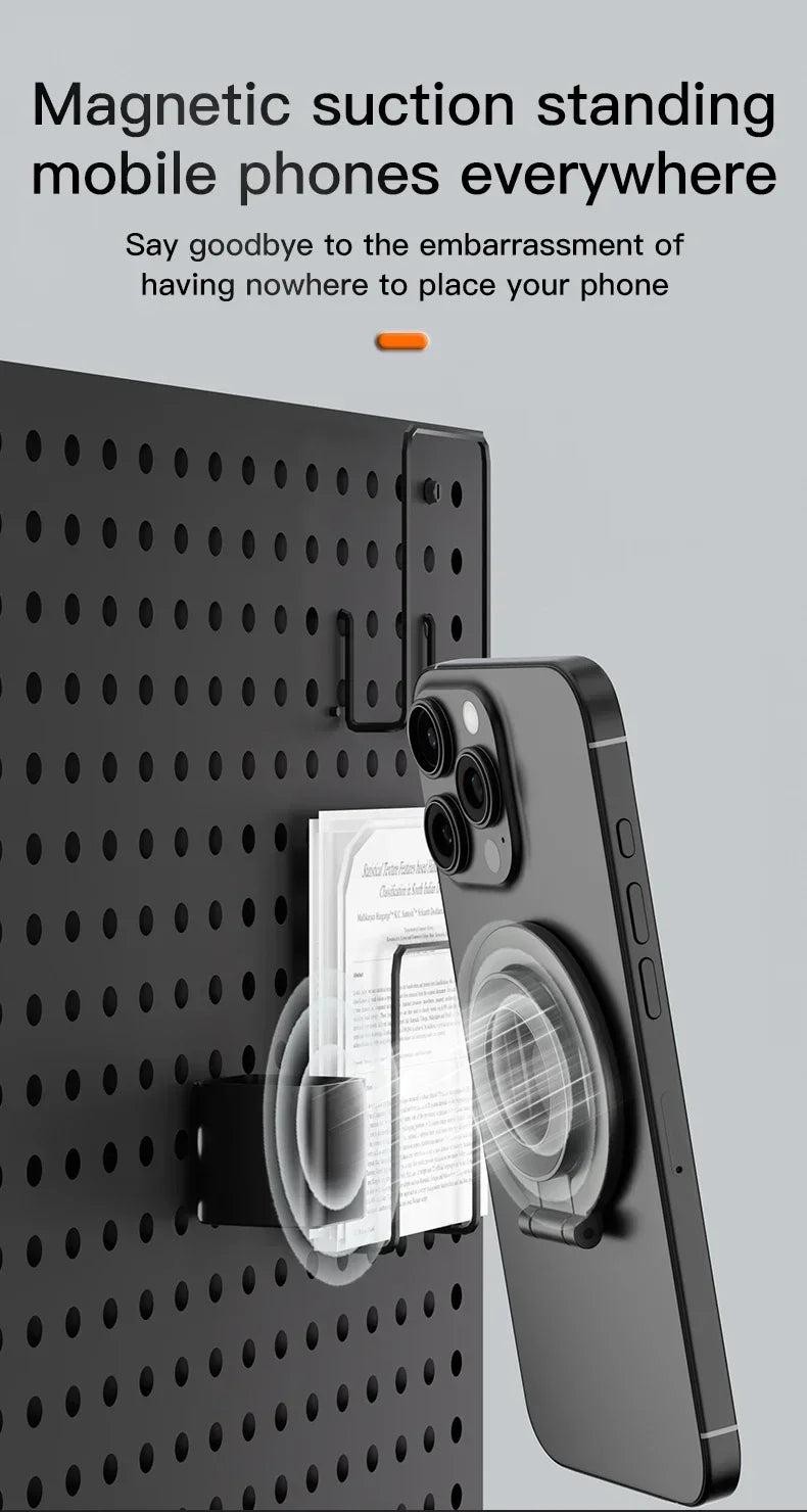 A magnetic suction phone stand holding a smartphone against a dark textured surface.