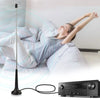Indoor high-gain digital radio antenna with a magnetic base plugged into an audio device.