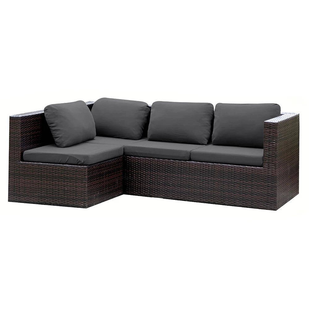 A dark brown wicker patio sofa cover set with four cushions and a backrest.