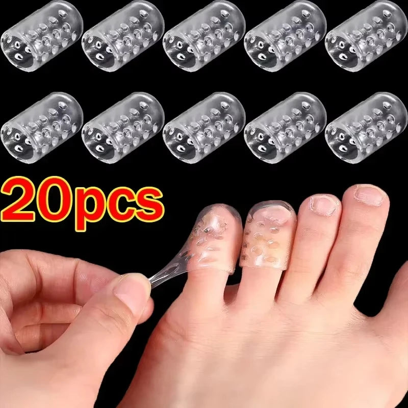 A set of clear gel toe caps for blister prevention and comfort shown next to a human finger.
