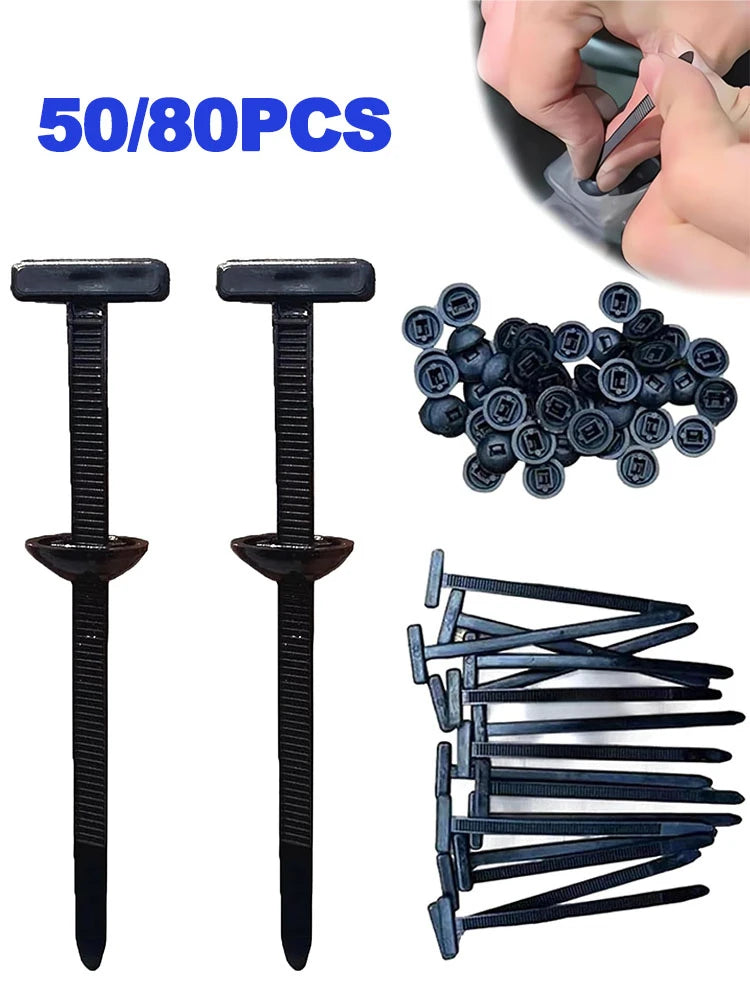 A set of black self-locking nylon cable ties and push clips, with individual ties and a pile of small black plastic clips sho