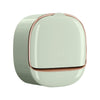 A round, light green wall-mounted ABS soap dish with a matching lid.