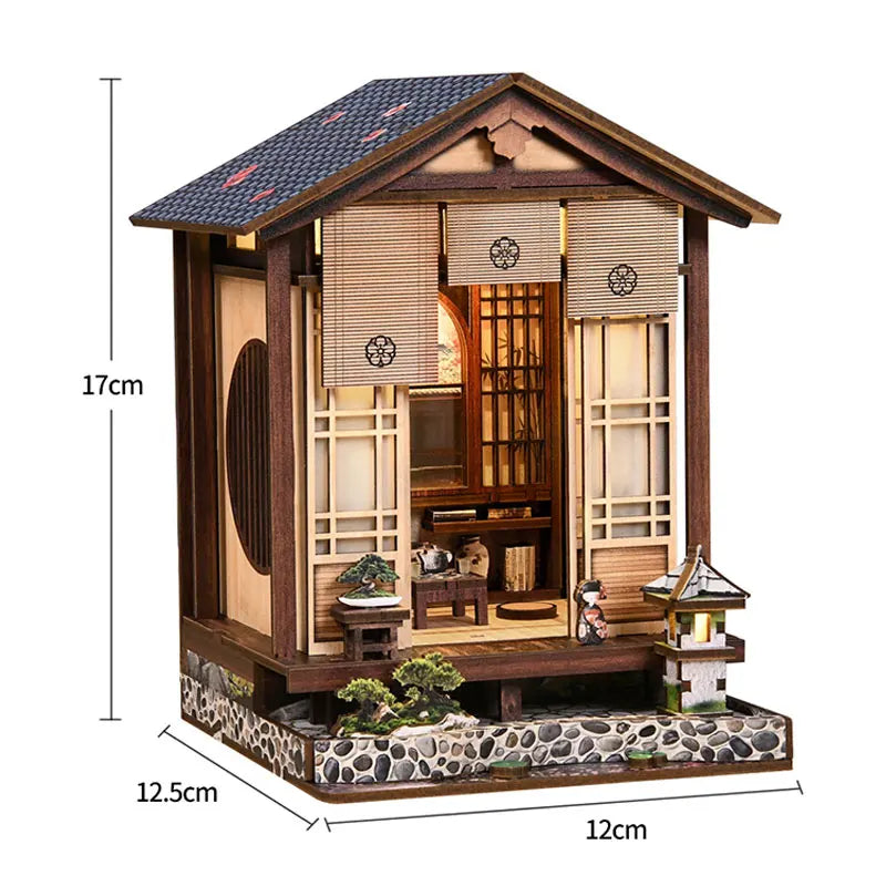 A wooden miniature Japanese sakura tea house kit featuring detailed architecture and an LED light.