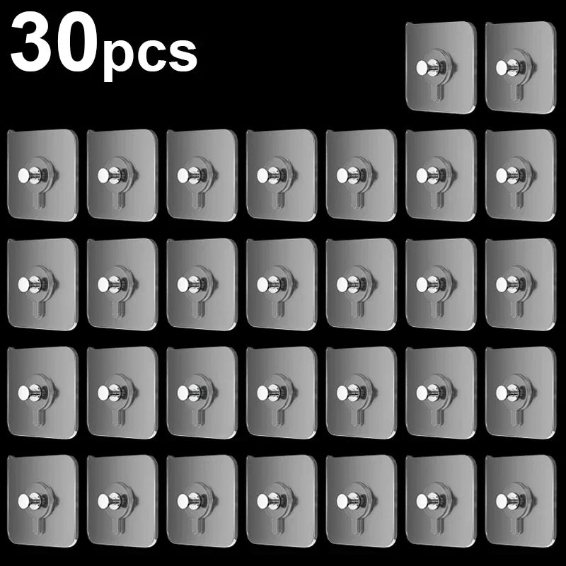 A grid of thirty self-adhesive wall hooks for frames and photos in a silver or metallic finish.