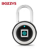 A silver fingerprint pad lock with a black housing and a circular keyhole is shown against a white background.