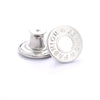 Silver metal button repair kit with a replacement button and a small tool.
