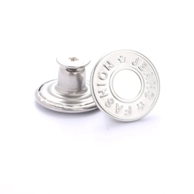 Silver metal button repair kit with a replacement button and a small tool.