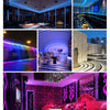 Interior shot of a luxurious room featuring pink and purple LED lighting accents and decorative elements.