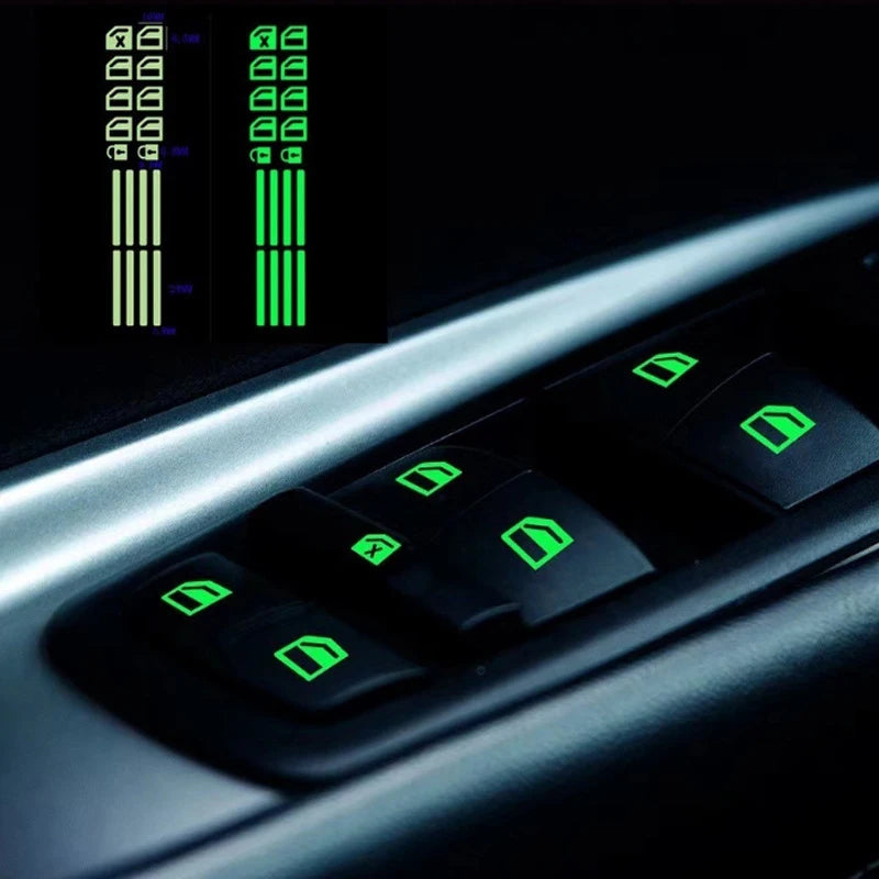 Close-up of a set of glow-in-the-dark car window button stickers and related components on a dark surface.
