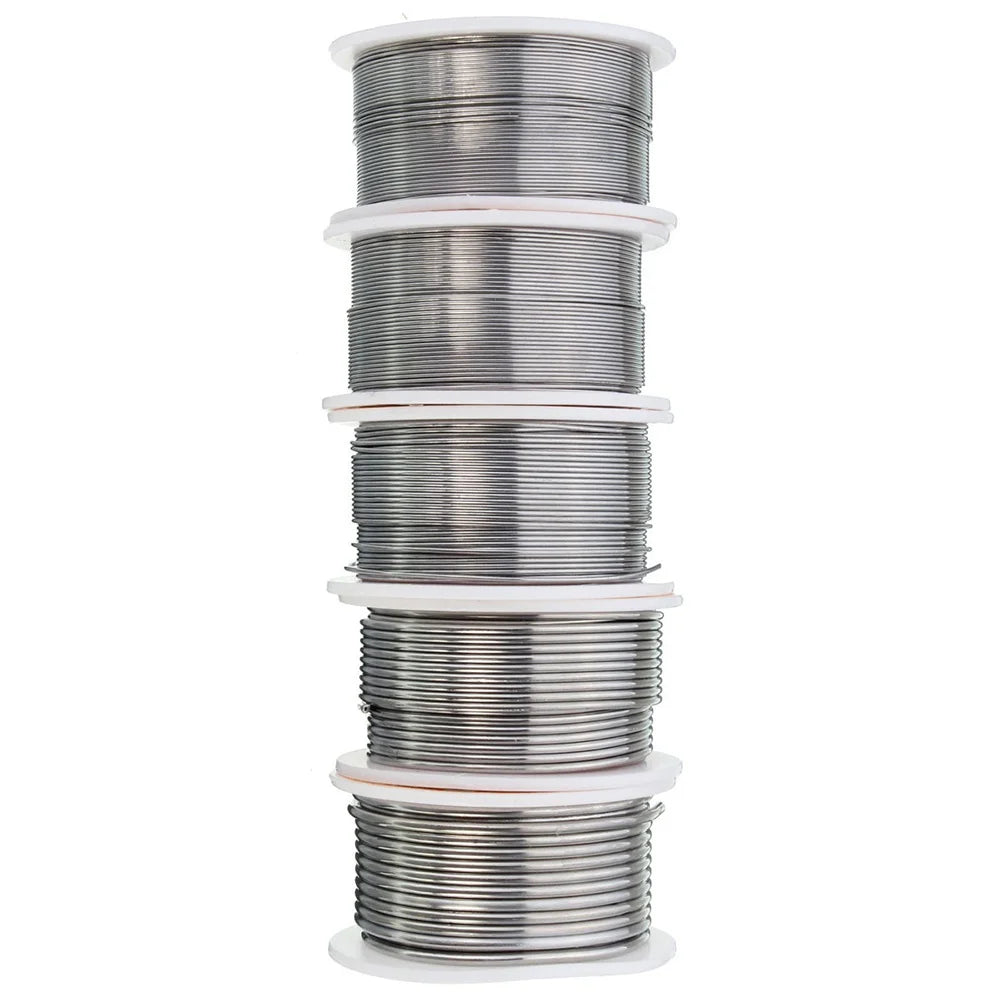 A stack of silver tin alloy solder wire spools, packaged with white plastic sleeves.