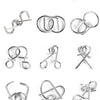 A collection of various metal wire puzzle brain teasers and tangles.