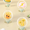 A collection of clear, round plastic toys featuring various animal designs like a duck, frog, and hand-eye shape for parent-c