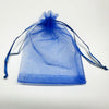 A translucent blue organza drawstring bag for gifts or party favors.