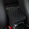 Black quilted PU car armrest cover with a storage pad and red stitching shown in a vehicle interior.