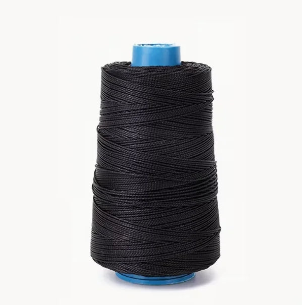 A spool of black heavy-duty waxed nylon thread with a blue core for sewing and repairs.