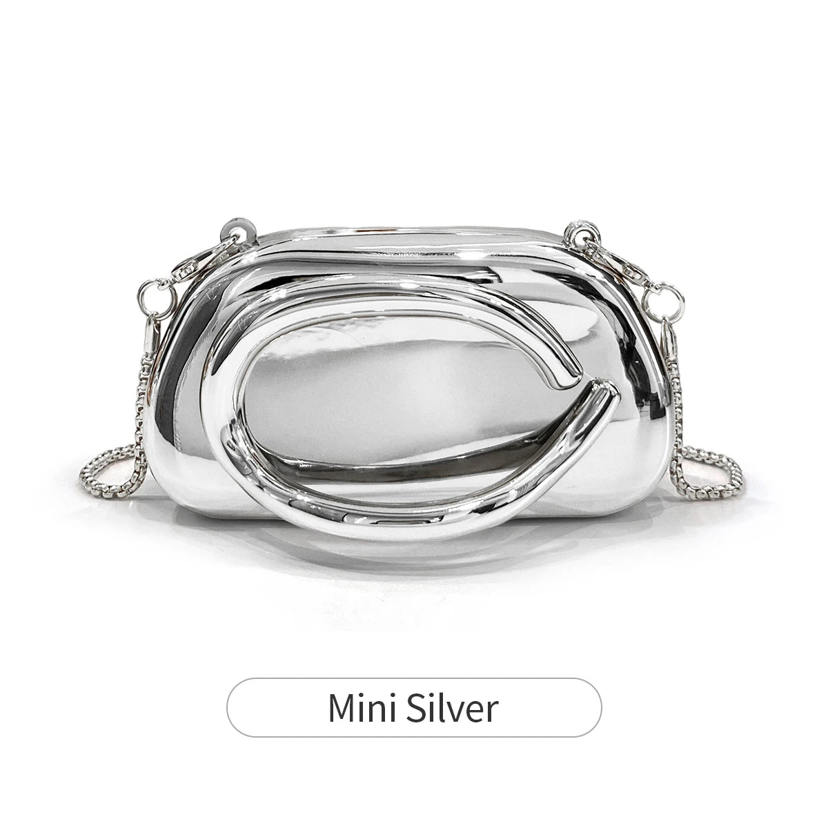 A small silver metal clutch bag with a curved design shown against a white background.