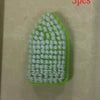 A green triangular floor brush with white bristles is shown against a light background.