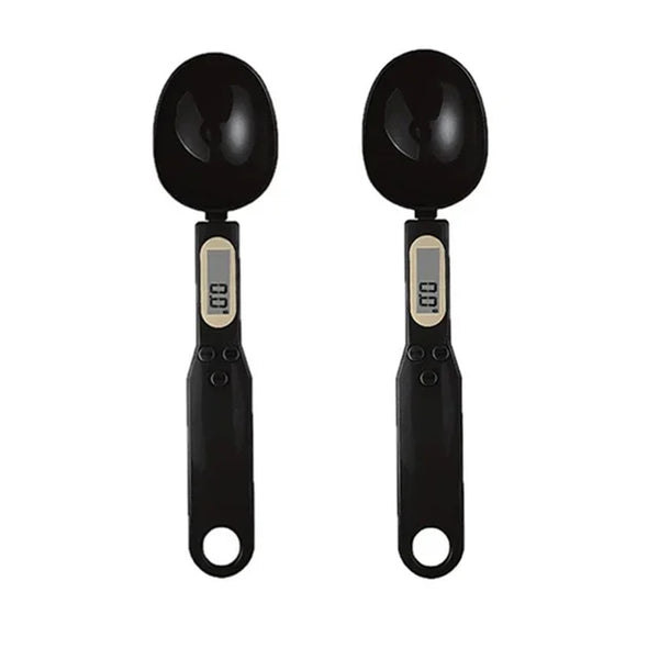A pair of black digital measuring spoons with LCD displays.