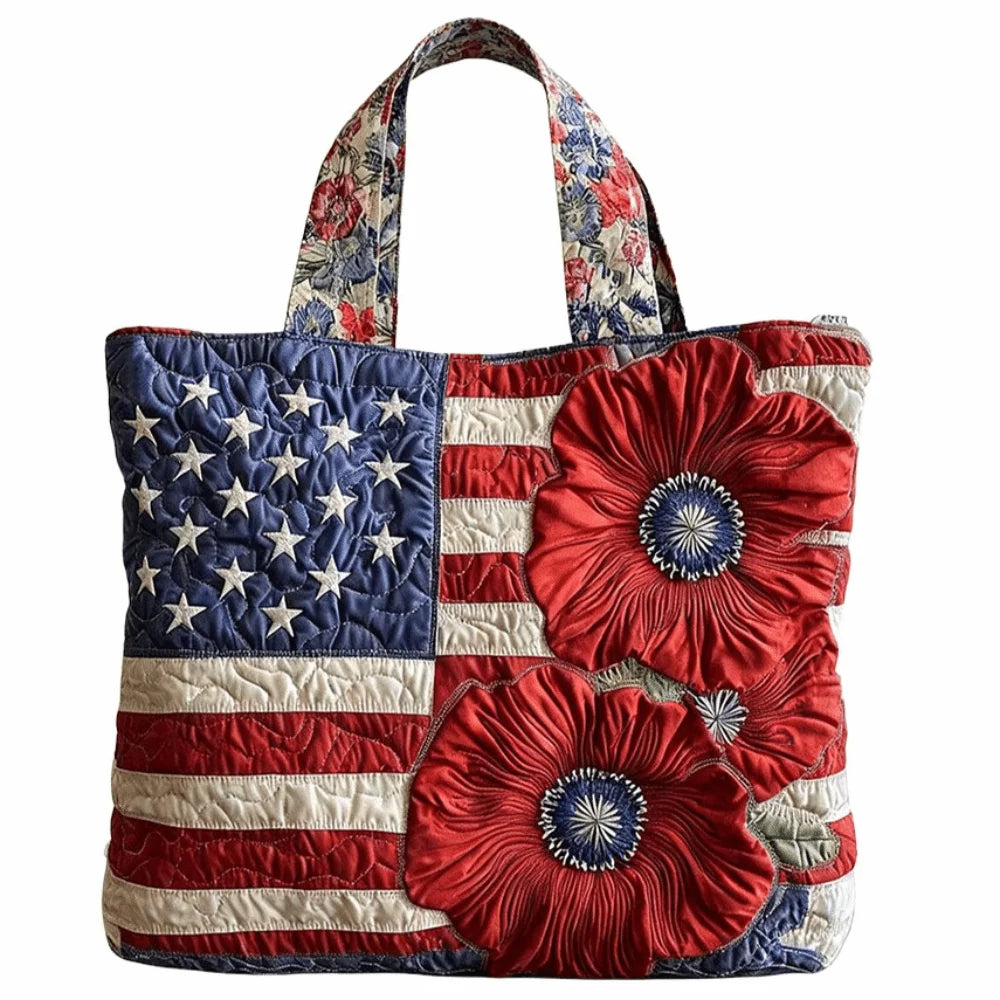 A vintage quilted tote bag featuring an American flag design with red, white, and blue stripes and stars.