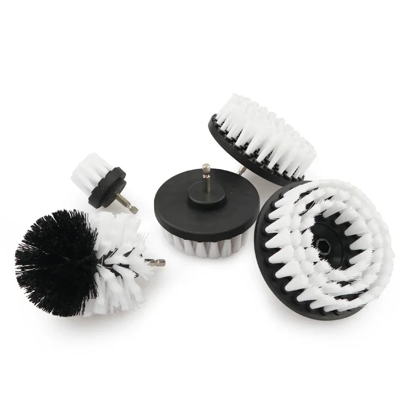A set of black and white drill brushes for cleaning tiles, bathroom surfaces, and cars.