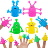 A hand displays five colorful monster finger toppers made of silicone in pink, blue, green, yellow, and purple.