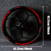 Black motorcycle wheel rim with red sports stripe decals shown against a dark background.