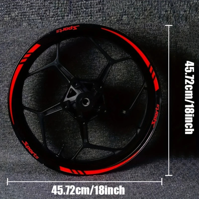 Black motorcycle wheel rim with red sports stripe decals shown against a dark background.