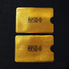 Two gold RFID protection cards are shown against a black background.