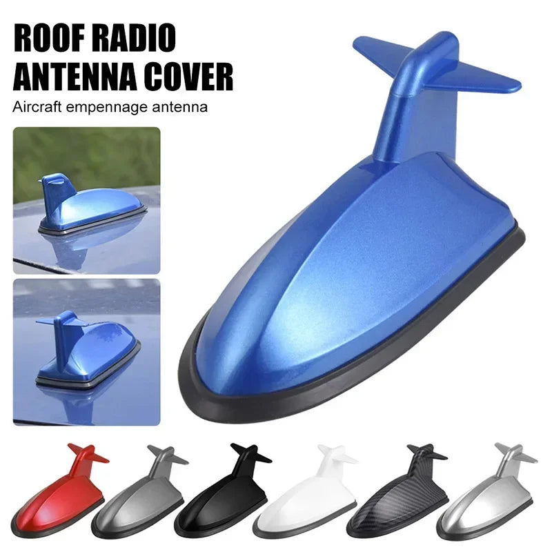 A collection of various aerodynamic antenna covers and boosters in red, black, silver, and blue colors.