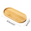 A light wood serving tray or shallow dish with dimensions 16.8cm by 8cm.