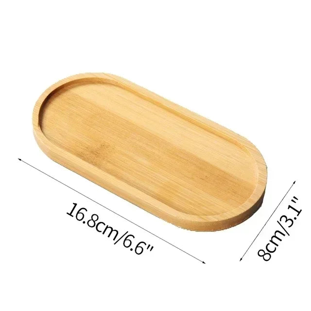 A light wood serving tray or shallow dish with dimensions 16.8cm by 8cm.