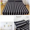 Black and white striped fitted bed sheet with an all-around elastic band