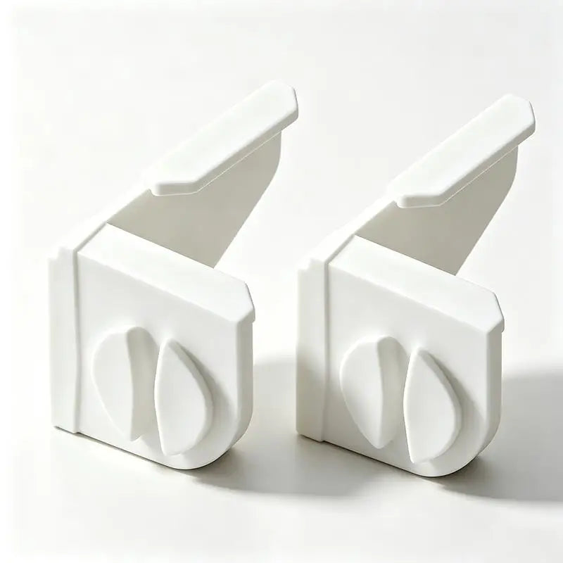 A pair of white masonry line corner clips with anti-slip locks shown from the side.