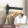 Black wall-mounted clothes drying rack with 10 holes for dual-use installation
