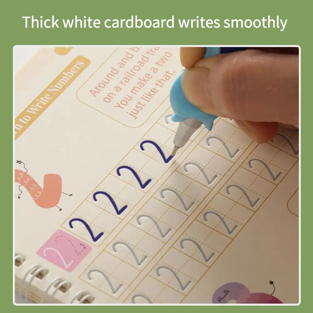 A hand writes smoothly on a white cardboard handwriting practice book with numbers and letters.