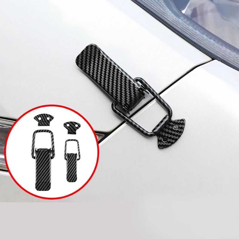 Black carbon fiber rear trunk locking buckle set for cars shown on a white vehicle.
