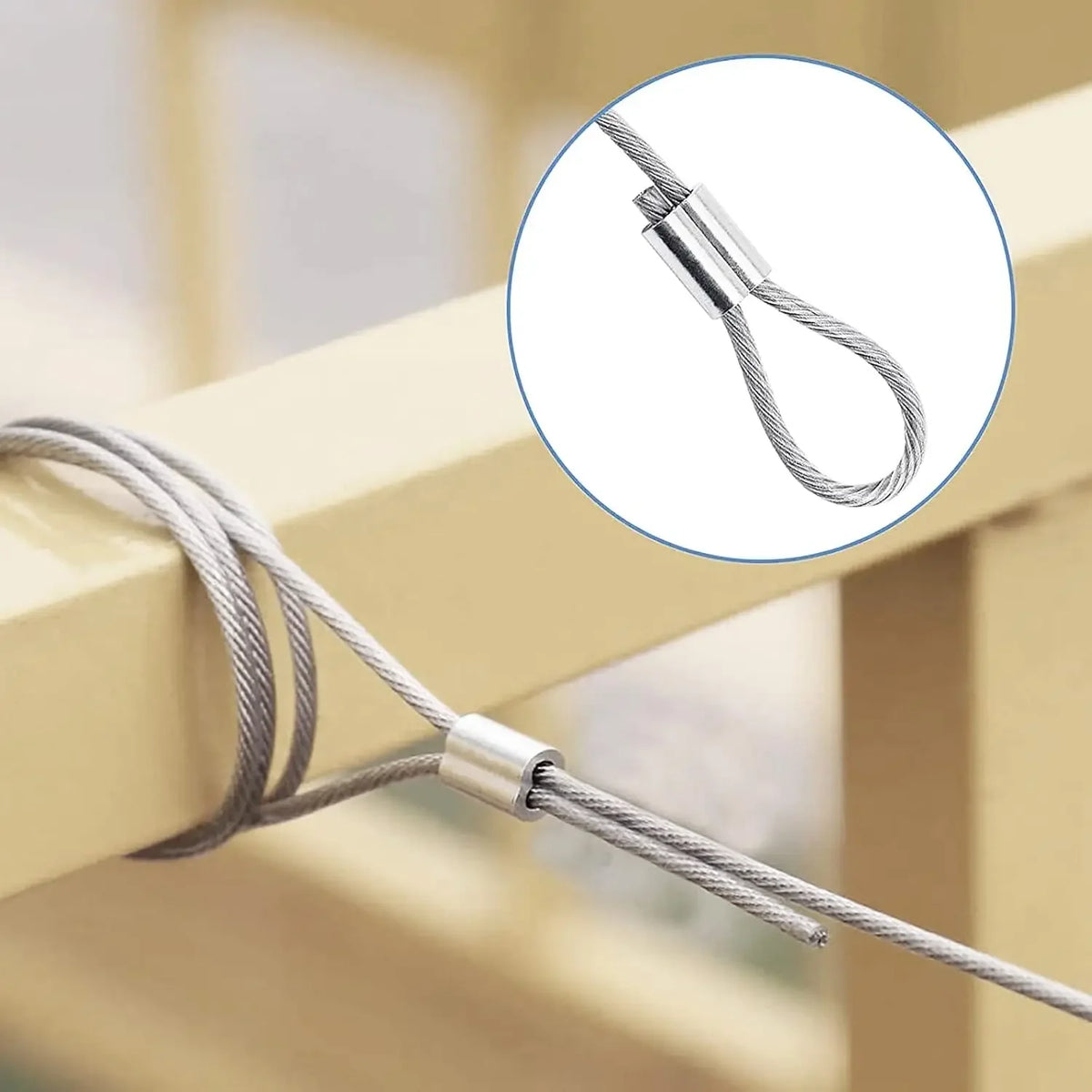 Close-up of an aluminum double barrel crimp sleeve used for wire rope, showing the crimped end and wire.