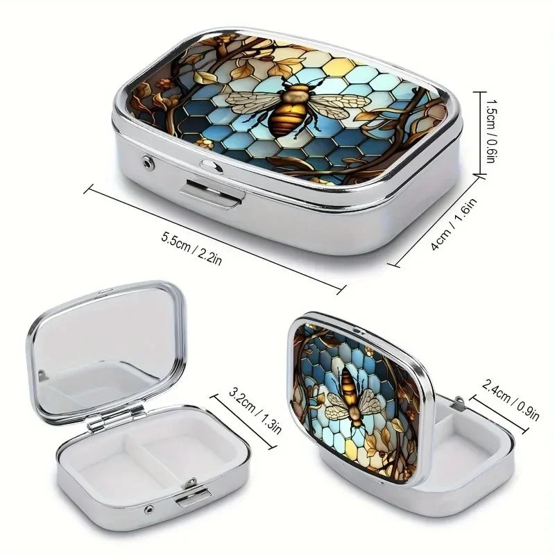 A portable metal pill organizer and jewelry case with a lid showing an intricate honeycomb pattern and a bee design.