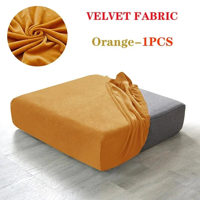 Orange velvet fabric sofa cover displayed on a gray sofa cushion.