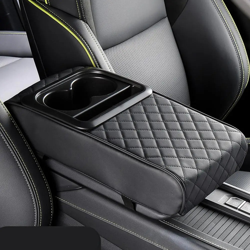 Black quilted car center console armrest cushion with a cup holder and textured upholstery