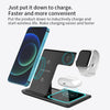 A black foldable wireless charging station is shown with an iPhone, Apple Watch, and AirPods placed on it for charging.