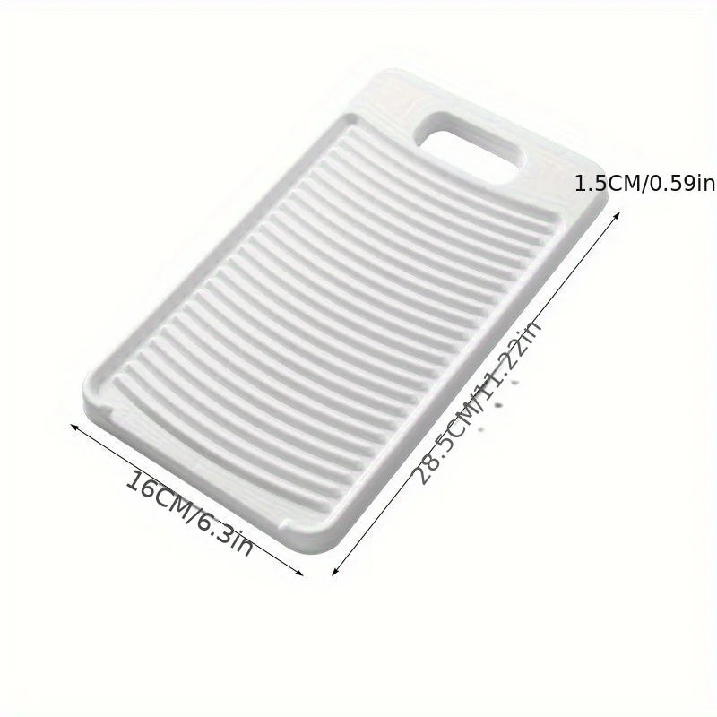 A white non-slip laundry scrubbing board with ridges and a handle, shown from above.