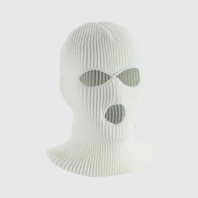 A white knitted ski mask car headrest cover with eye openings and a cutout for the face.