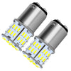 A pair of silver LED bulbs designed for brake, reverse, and turn signals.