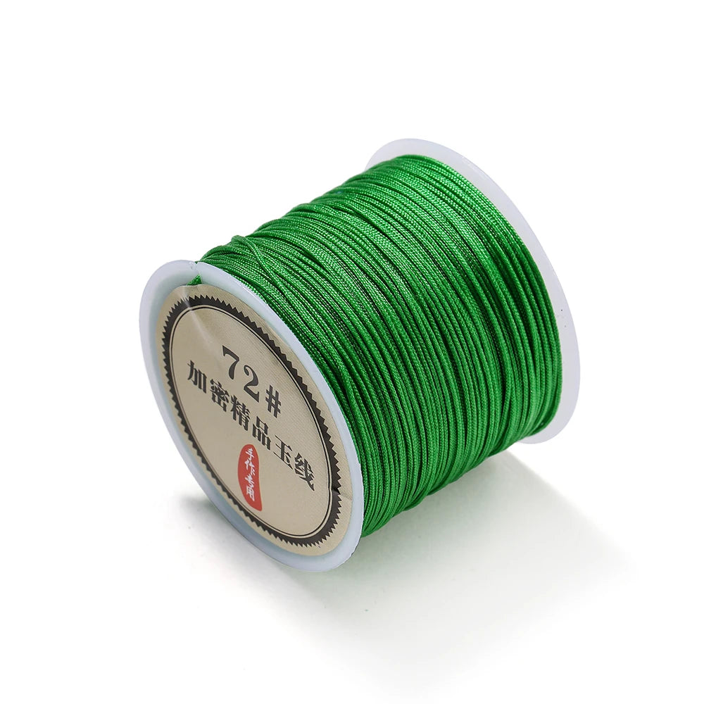 A spool of bright green 0.8mm nylon macramé cord for jewelry making with a label indicating 72#