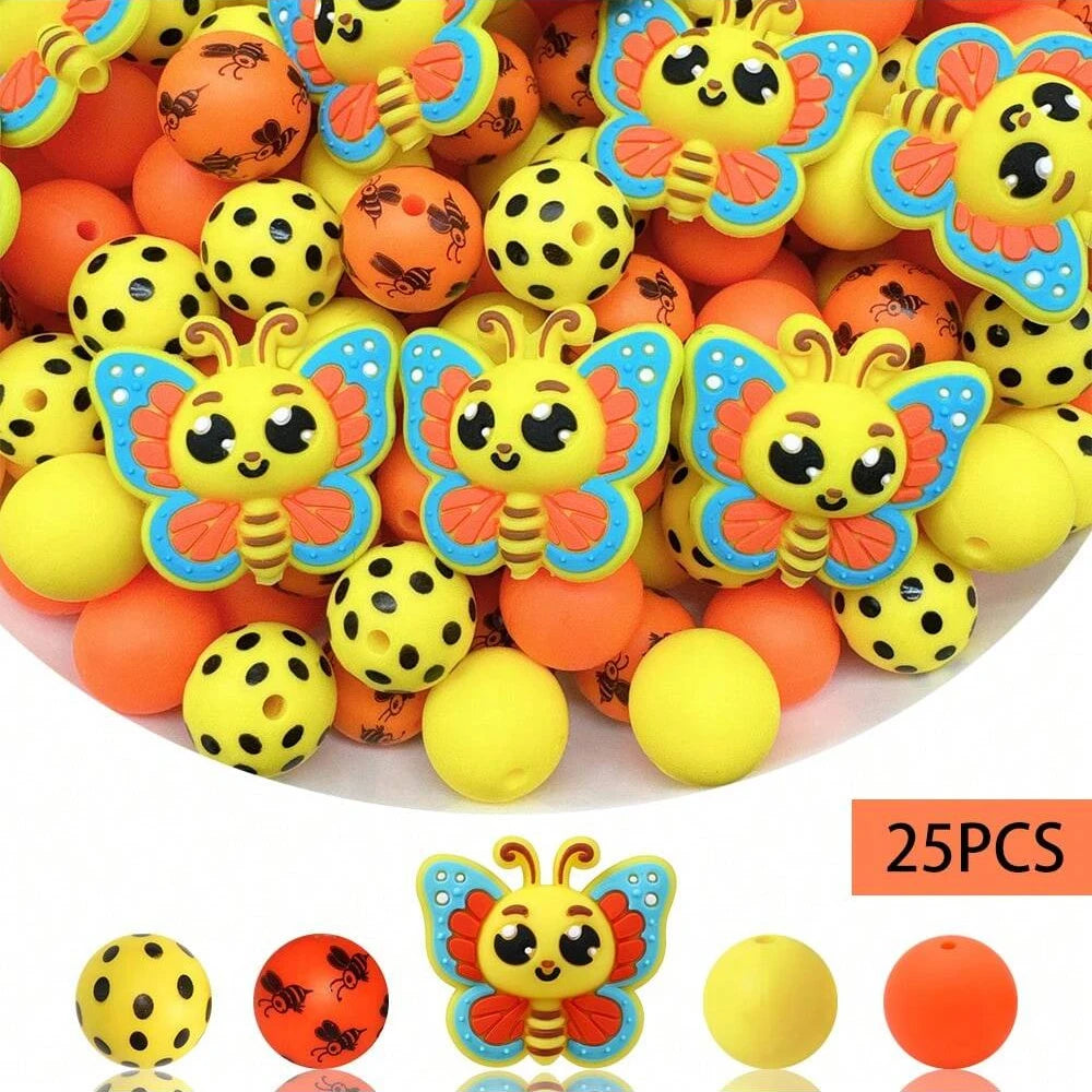 A pile of colorful 3D bee silicone beads in yellow, orange, and black for jewelry making and DIY crafts.