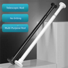 A pair of black and white telescopic rods, including a multi-purpose rod and a telescoping rod, are shown against a light bac
