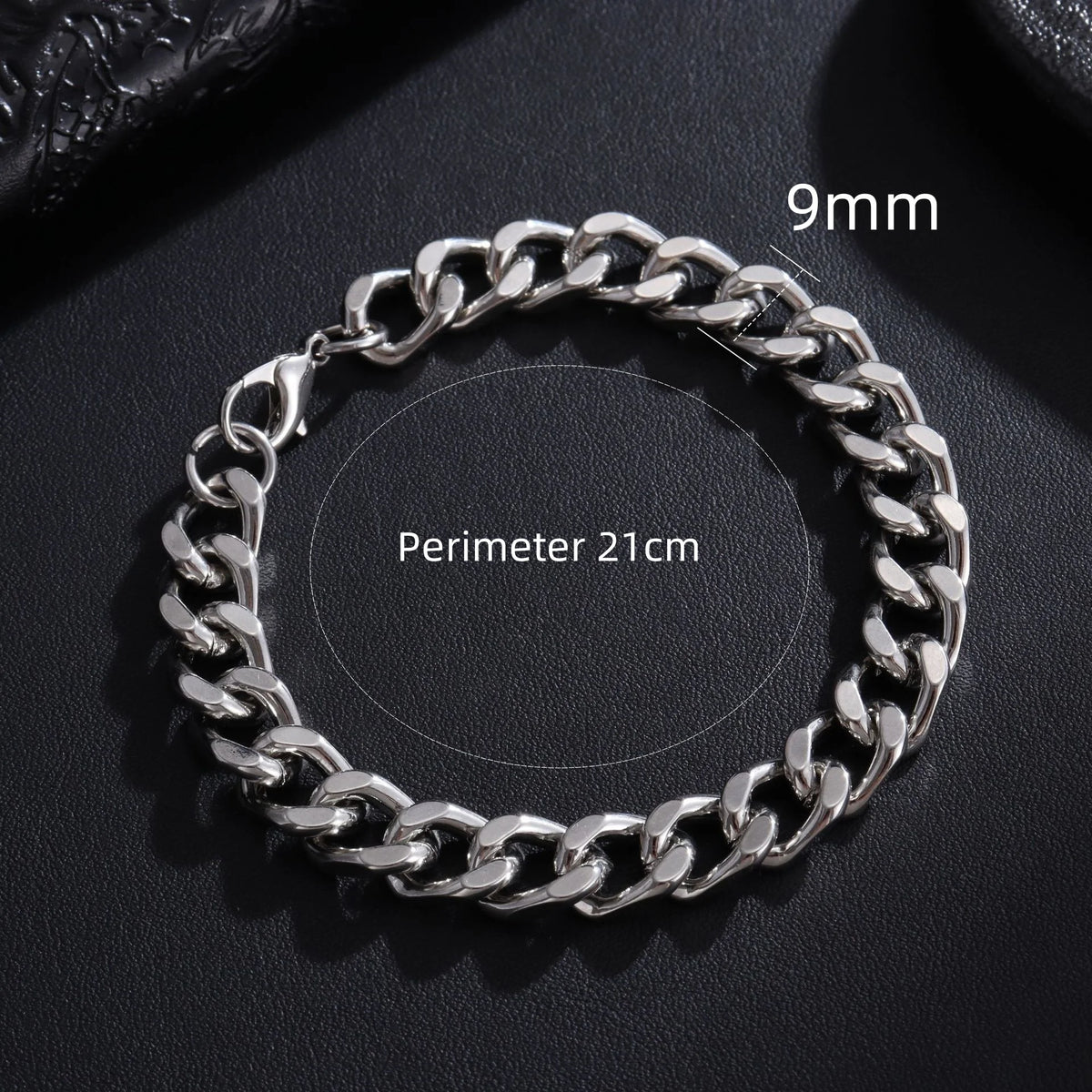 A silver stainless steel Cuban link bracelet with a 9mm chain and a perimeter of 21cm.