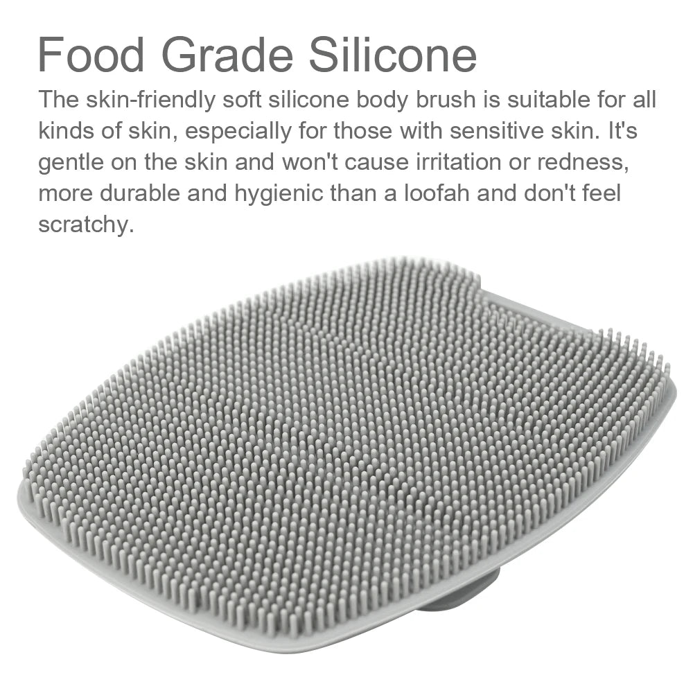 A gray silicone body brush with numerous small, rounded bristles shown from above.